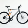 Flexibles Textilschloss tex-lock orbit in orange am urwahn Fahrradrahmen und Reifen
