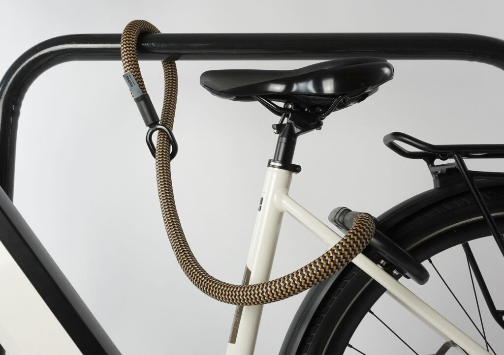 tex–lock mate in wild hemp extends frame lock by securing bike to bike stand