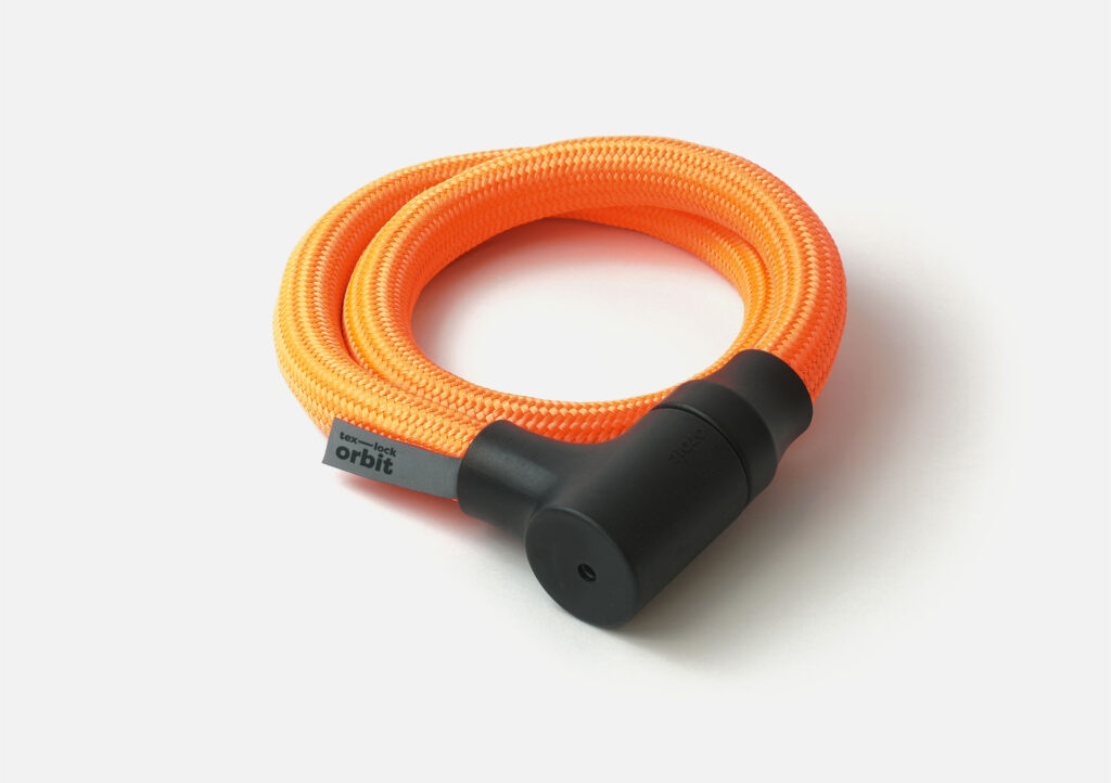 tex–lock orbit in acid orange, ineinander gewickelt und verschlossen