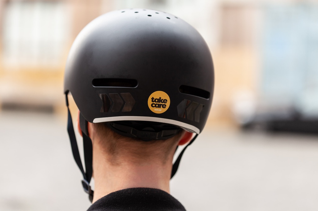 Reflektierender Aufkleber „tex—lock“ auf Fahrradhelm-Rückseite